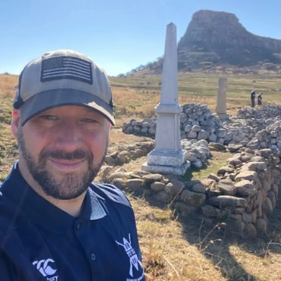 Dan Gillespie visiting a battlefield memorial in South Africa